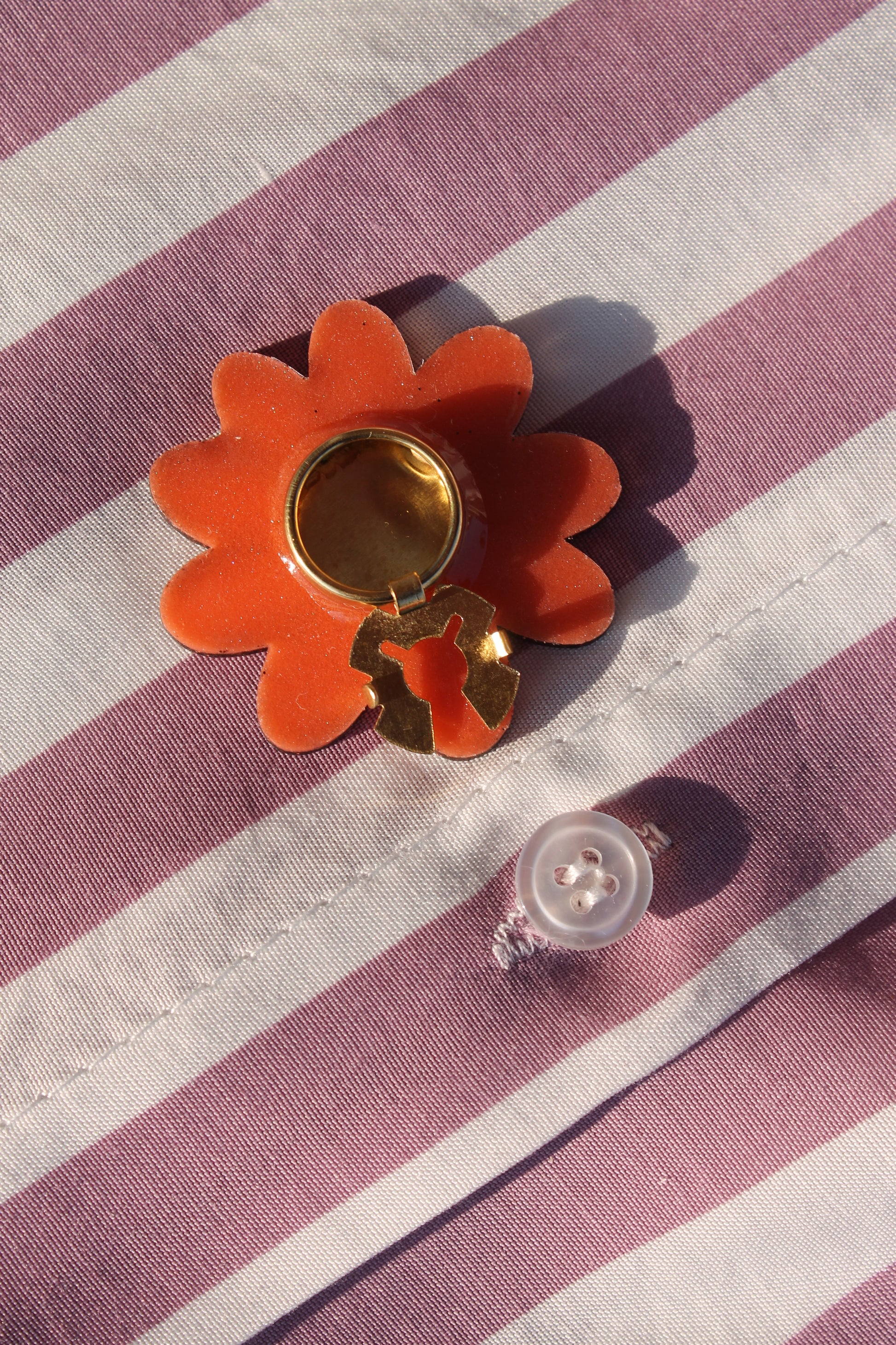 Cache boutons Marguerite